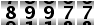 89977